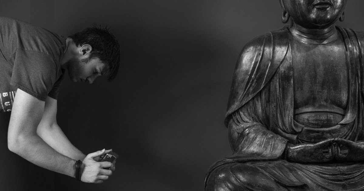 Members of the Ball State University FAB Lab 3D scan the Amida Buddha sculpture at the David Owsley…